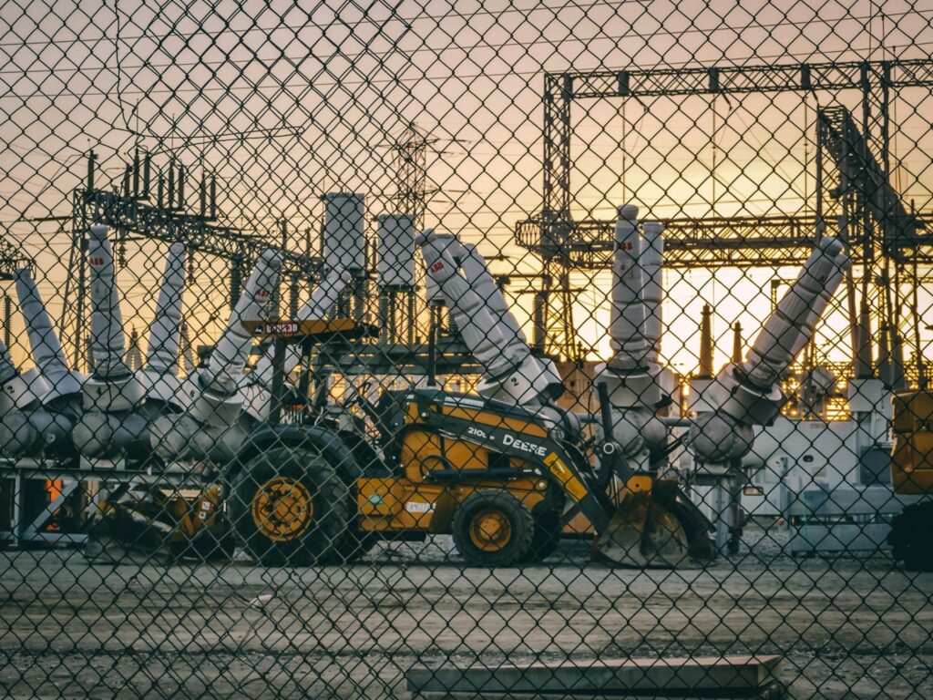 Industrial power infrastructure supporting heavy equipment at an active work site